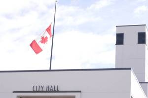 The Maple Leaf at half-mast atop Revelstoke City Hall on Wednesday morning, Feb. 11, the day after the deadly shooting at Tumbler Ridge Secondary School in northeastern B.C. (Evert Lindquist/Revelstoke Review)